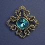 Broche-colgante Acento con cristal turquesa y strass 40 mm +
