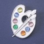 Broche Paleta, esmalte multicolor, metal plateado 38×29 mm+
