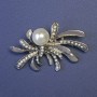 Broche 'Acento' con perla blanca y strass
