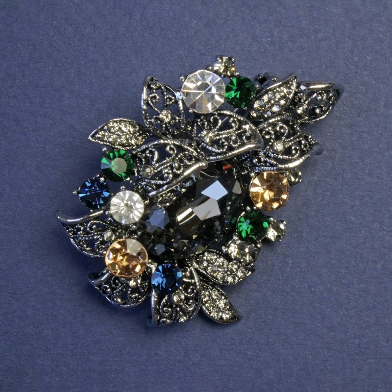 Broche «Acento» con cristales multicolores 48×35 mm ± metal plateado