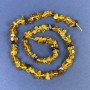 Cuentas de ámbar trocitos 5–9×4 mm, en hilo, longitud 39 cm+