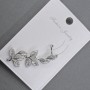 Arete tipo cuff para la oreja de metal plateado, 14×38 mm ±, con strass blancos