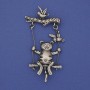 Broche gato de metal plateado