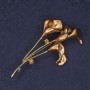 Broche Kala con strass, esmalte marrón y metal dorado, 35x60 mm+