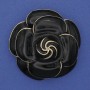 Broche en forma de flor, esmalte negro y metal dorado 45 mm+