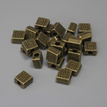 Abalorio con inserción de bronce, color bronce, diámetro 6x6 mm ±, diámetro de orificio ~2,3 mm ±, presentación 25 uds. +
