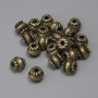 Abalorio inserto bronce, color bronce, diámetro 6×7 mm, agujero 2,2 mm, empaque de 22 uds.