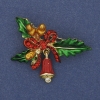 Broche-colgante navideño «Rama con lazo y cascabel», esmaltado, con cristales y metal dorado, 44×30 mm+