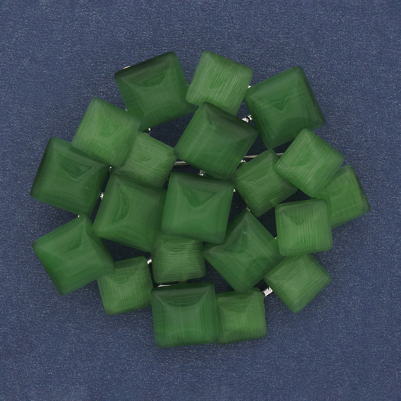 Broche-colgante «Énfasis» con ojo de gato verde