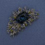 Broche 'Énfasis' con cristal azul