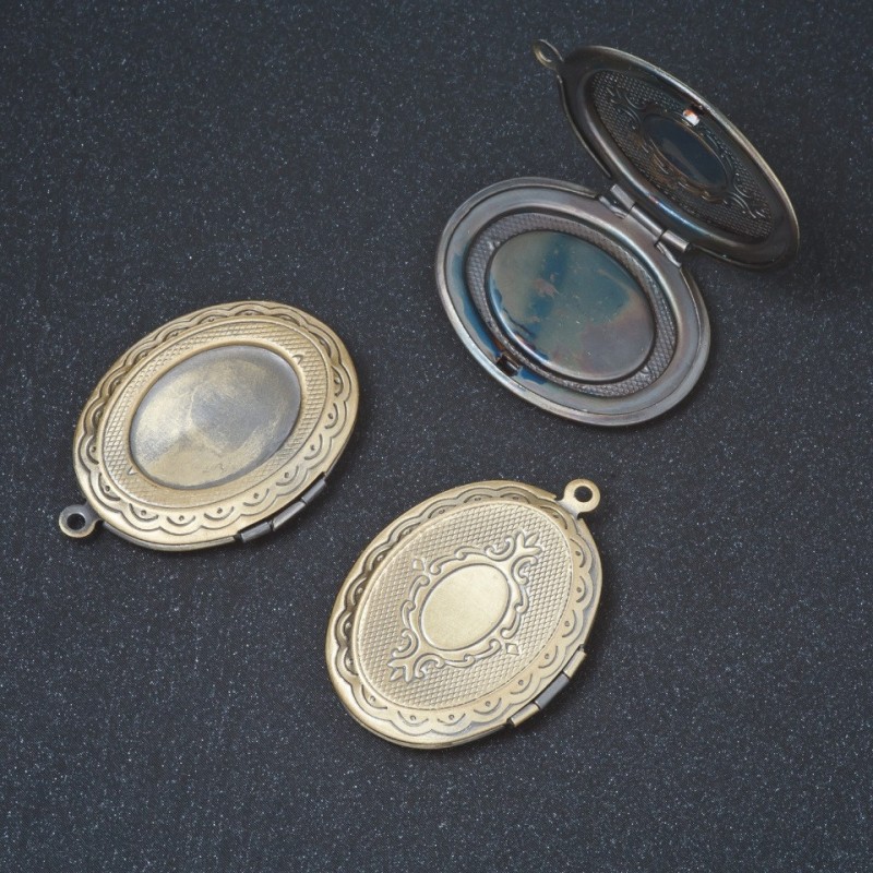 Colgante con secreto en cierre, color bronce, 3 × 2,4 cm