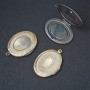 Colgante con secreto en cierre, color bronce, 3 × 2,4 cm
