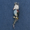Broche «Cacatúa Kakadú» 7x1,5 cm, metal gris