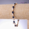 Pulsera Xuping con zirconias azules «Zafiro», grosor 9 mm, longitud 18–21 cm, rodio y baño de oro 18K