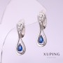Pendientes Xuping con piedra azul 25×8 mm, baño de rodio