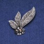 Broche hojas con strass en metal gris 60 mm