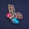 ¡Rebaja! Broche de mariposa con cristales, metal plateado 28×45 mm