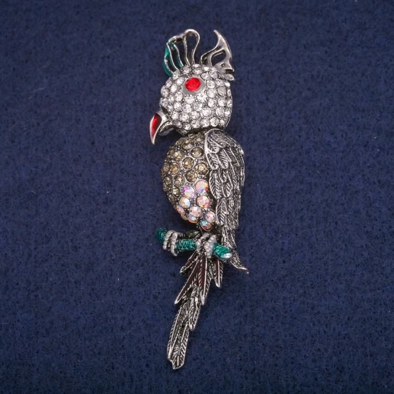 Broche 'Pájaro Kakadú' 7x1,5 cm metal gris