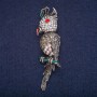 Broche 'Pájaro Kakadú' 7x1,5 cm metal gris