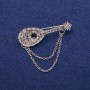 Broche Laúd con cristales grises 17×50 mm, metal plateado
