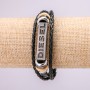 Pulsera con inserción metálica DIESTL, longitud 19–21 cm, grosor 14 mm, cuero ecológico negro, cierre de botón metálico