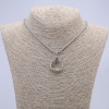Colgante-anillo de 24×5 mm en cadena, longitud 70 cm, metal plateado