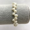 Pulsera de perlas barrocas «Mariposa» en goma elástica, diámetro 6-7 mm (+-), longitud 18 cm
