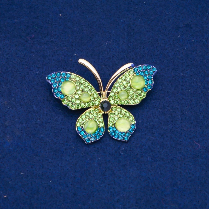 Broche Mariposa con cristales de strass verdes y azules