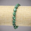 Pulsera elástica de malaquita prensada – cuentas ovaladas lisas, diámetro 10×8 mm, longitud 18 cm