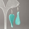 Pendientes de turquesa azul prensada, ovalados planos torcidos 35×23 mm, longitud 55 mm +