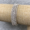 Pulsera espiral de cinco vueltas con strass blancos pequeños, circunferencia 18–22 cm