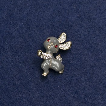 Broche 'Conejito' dorado en metal, esmalte y cristales de strass 24×21 mm +