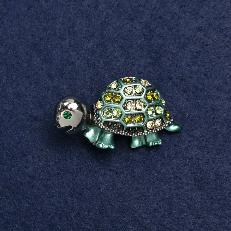 Broche Tortuga plateada de metal, esmalte y strass 40×23 mm +