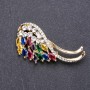 Broche con strass multicolor 55×25 mm, metal dorado
