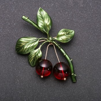Broche Cerezas doradas 55×43 mm