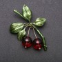 Broche Cerezas doradas 55×43 mm