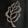 (35/60 mm) Broche de metal con baño de plata - Hoja con strass