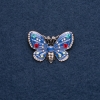 Broche «Mariposa» esmaltado azul y dorado