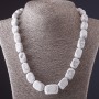 Collar 'Victoria' de caolín, en barra, con incremento de 0,8×2,5 cm, longitud 50 cm